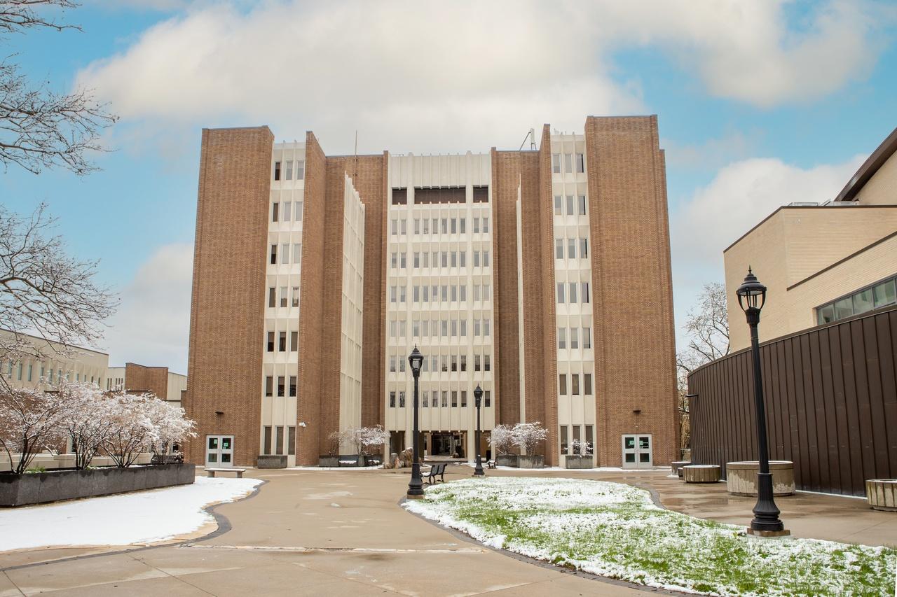 Front view of KTH with the Arts Quad walkway.