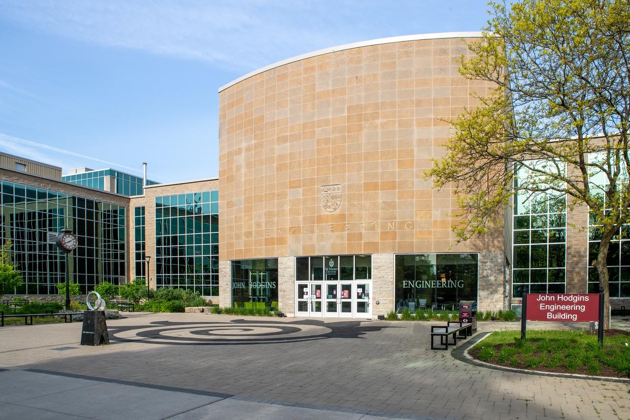 Front view of JHE with the iron ring and the building sign.