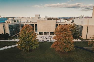 Arial view of front side of JHE with the field.