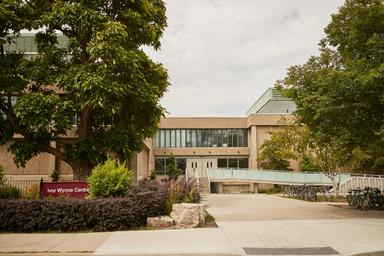Front view of IWC main entrance with the building sign.