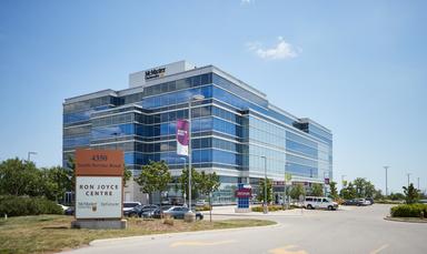 Angled view of the RJC building with the entrance sign.