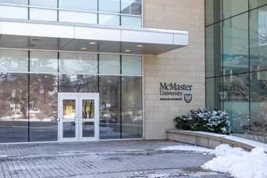 Close up of the HSC main entrance with the building sign.